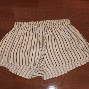 white shorts with blue and yellow stripes